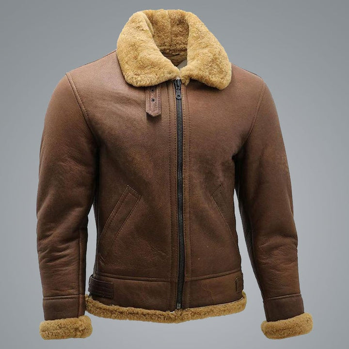 Brown leather jacket with fur collar and cuffs on a gray background