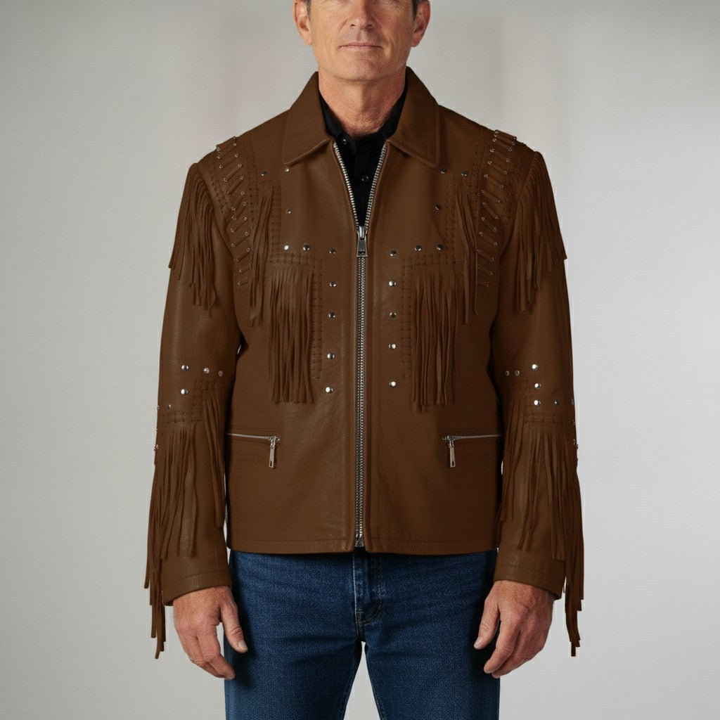 Man wearing a brown leather jacket with fringes and studs on a plain background