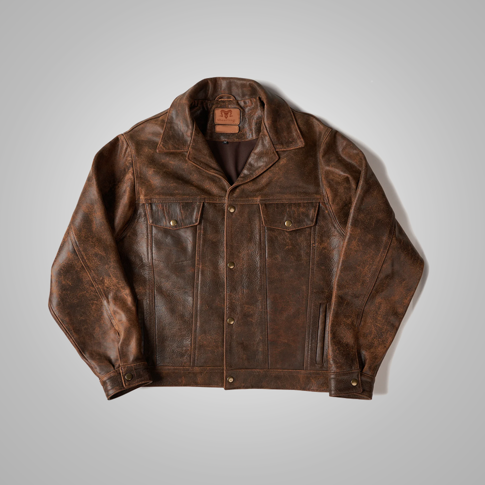 Brown leather jacket on a gray background
