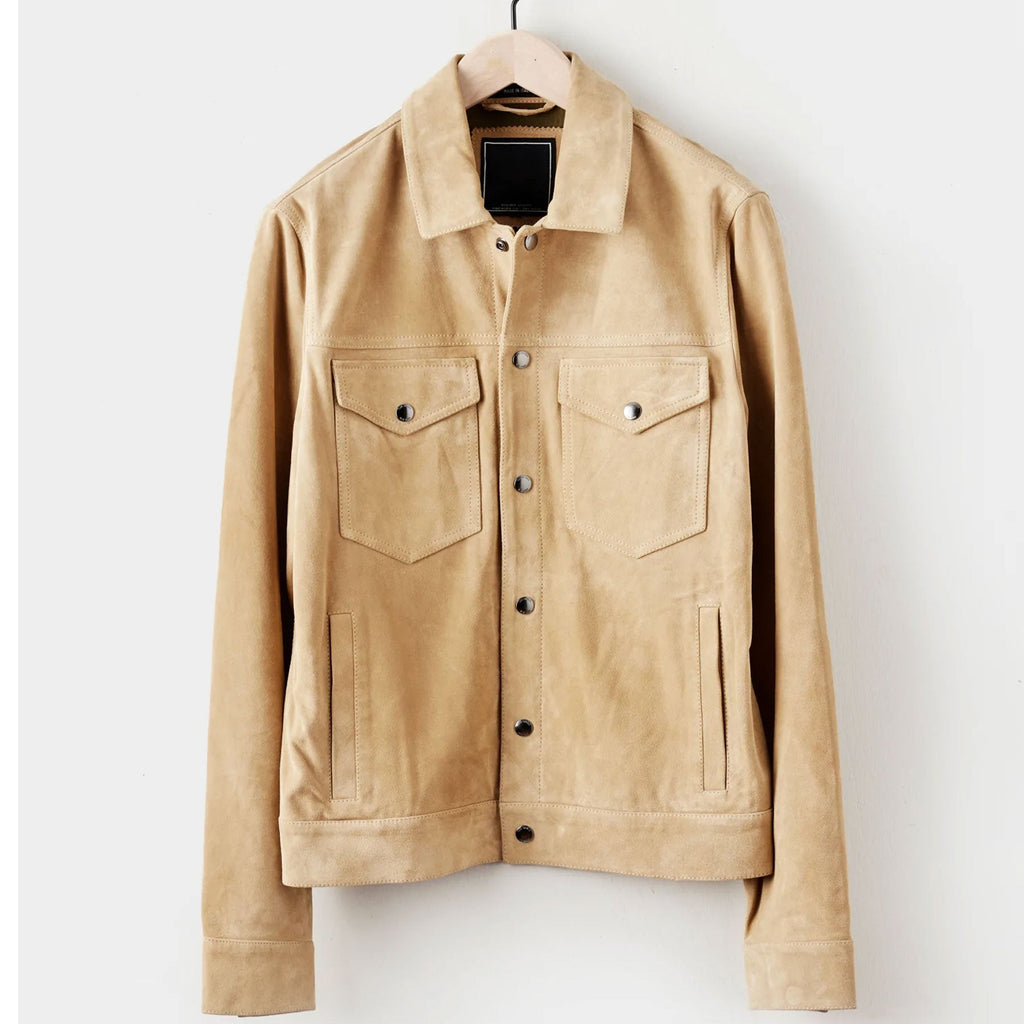 Beige jacket on a hanger against a white background