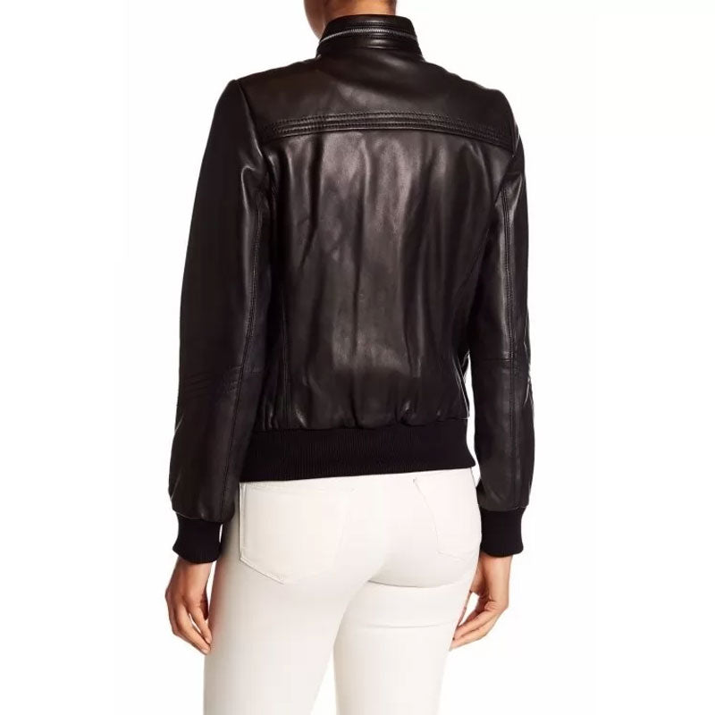 Black leather jacket worn by a person on a white background