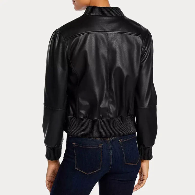 Black leather bomber jacket worn by a person on a light gray background