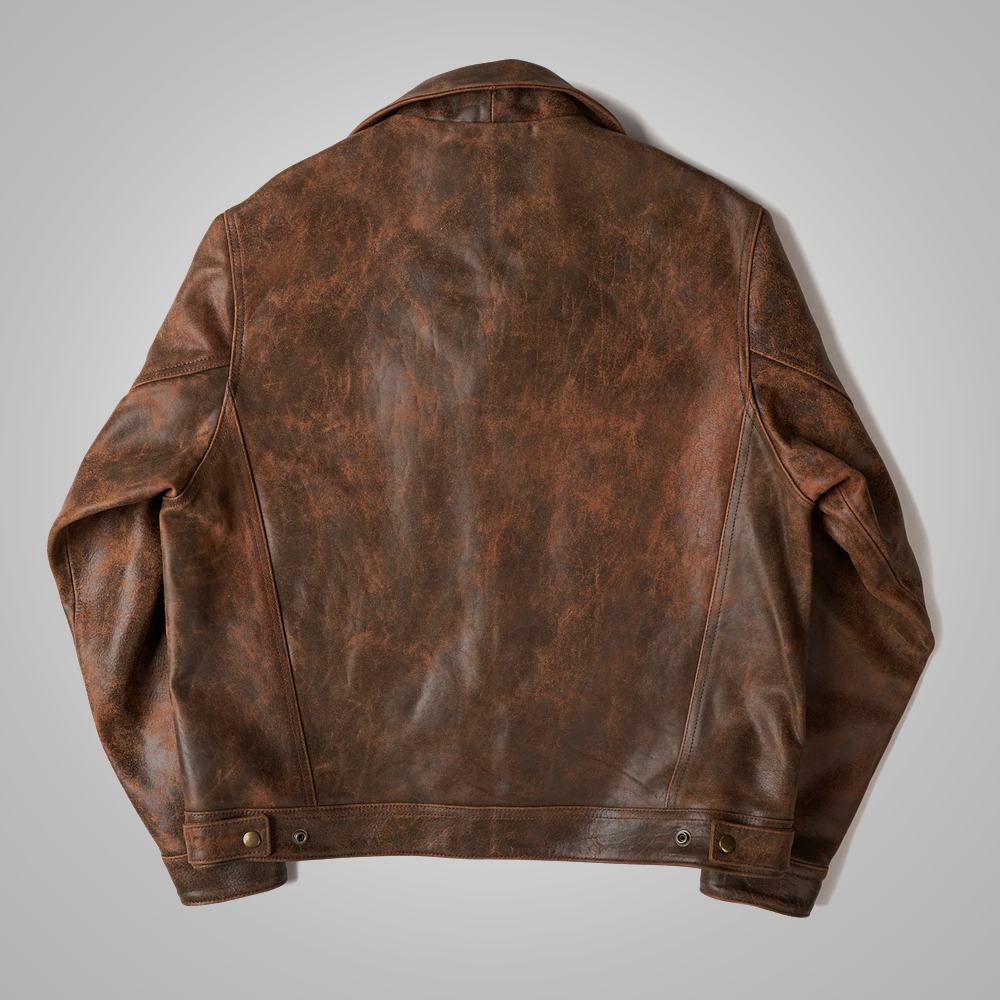 Brown leather jacket on a gray background