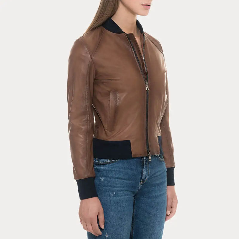 Brown leather jacket worn by a person on a white background
