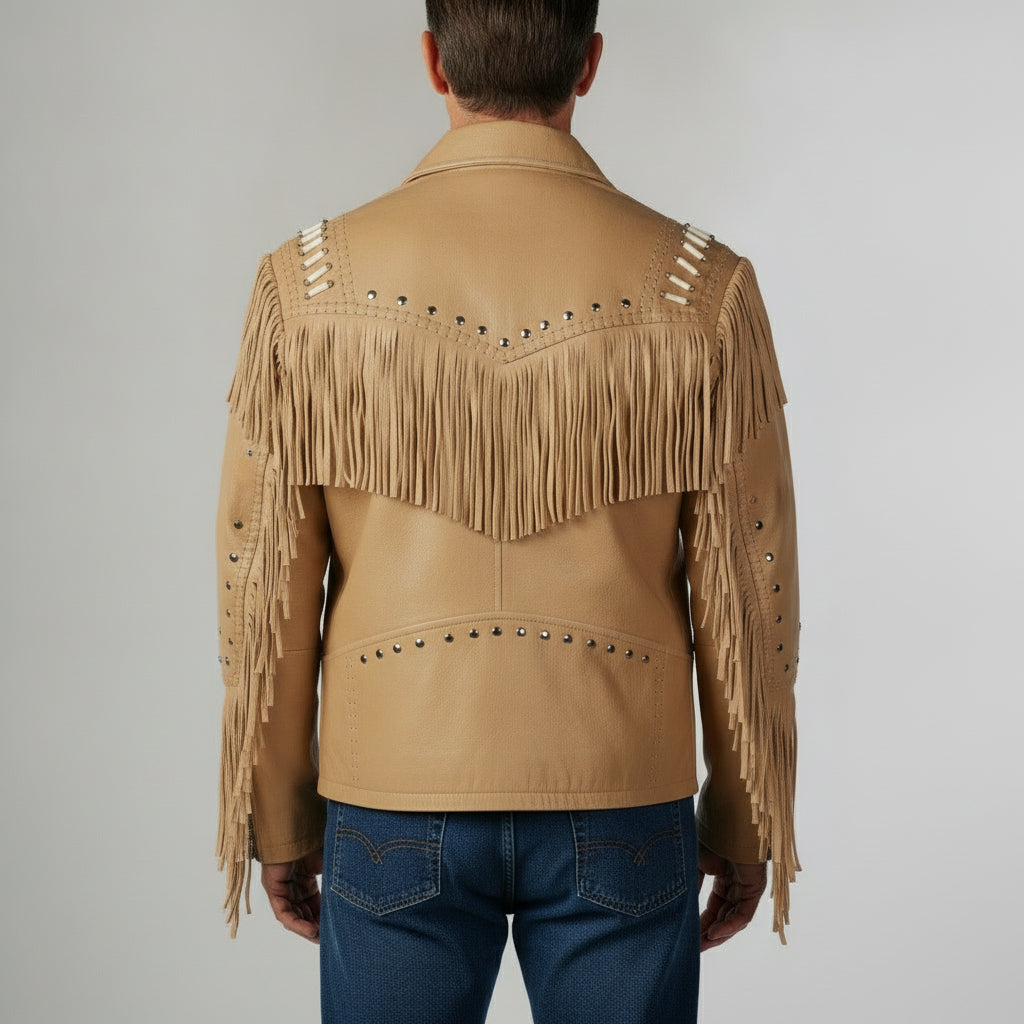 Beige fringed leather jacket worn by a person on a plain background
