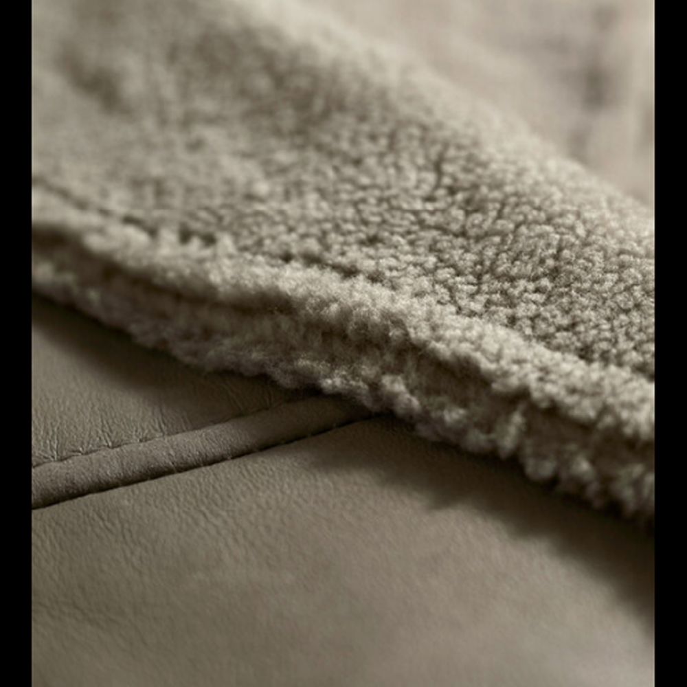 Close-up of a textured fabric surface with a focus on texture and color.