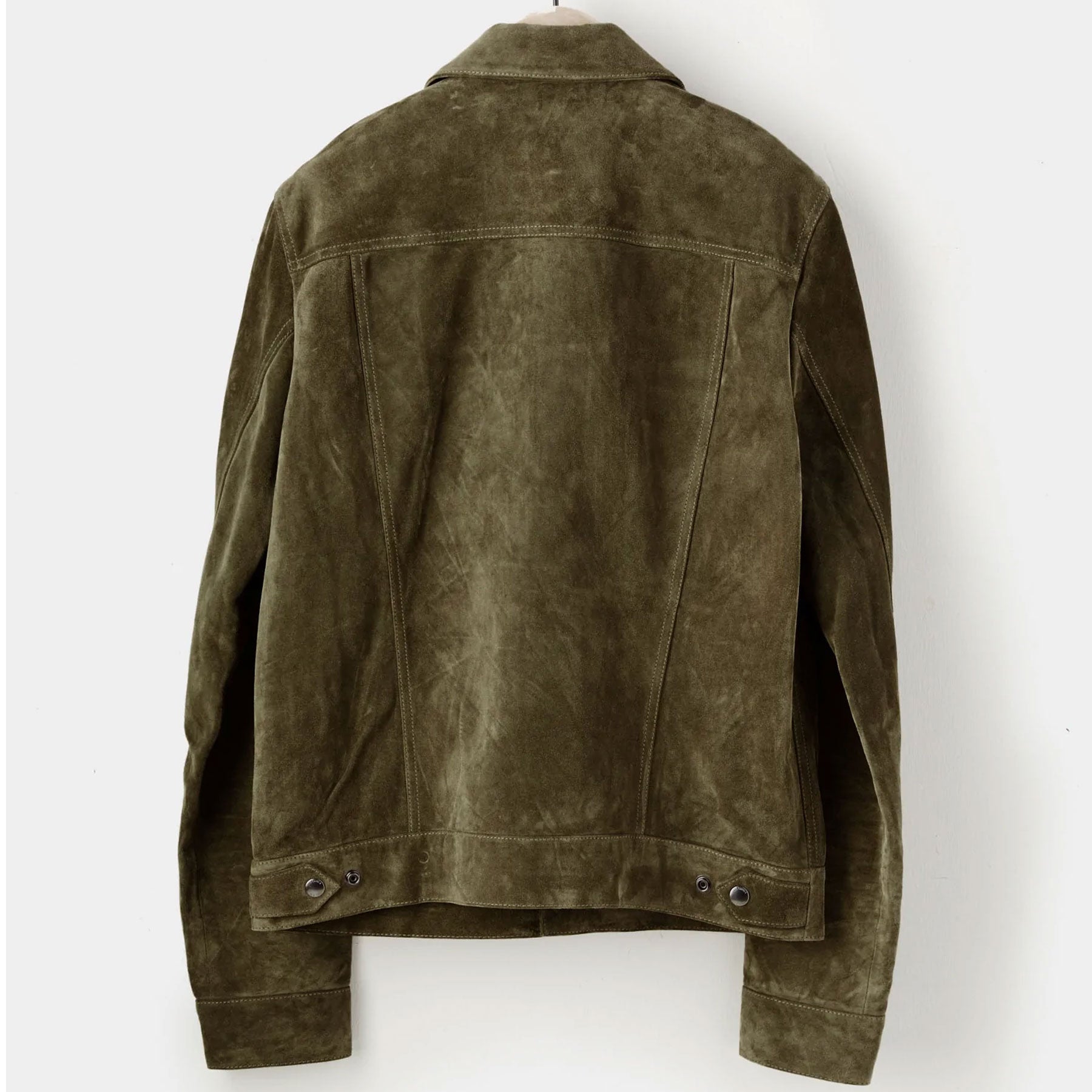 Green suede jacket on a white background