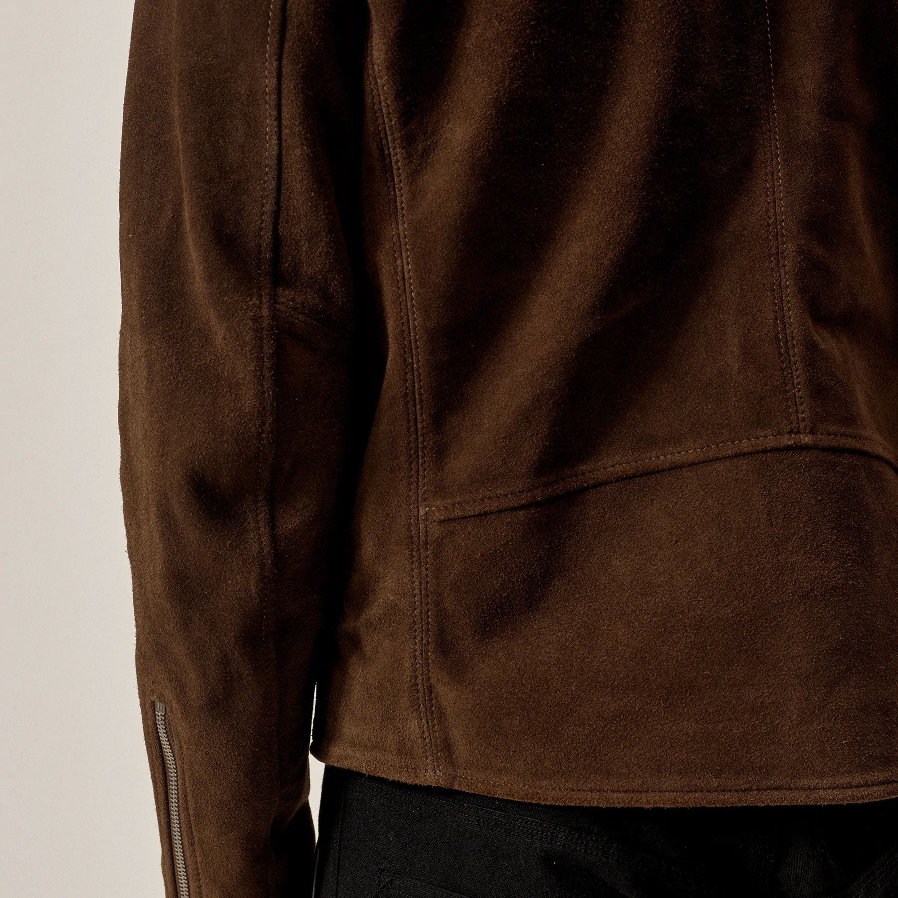 Brown jacket with a neutral background