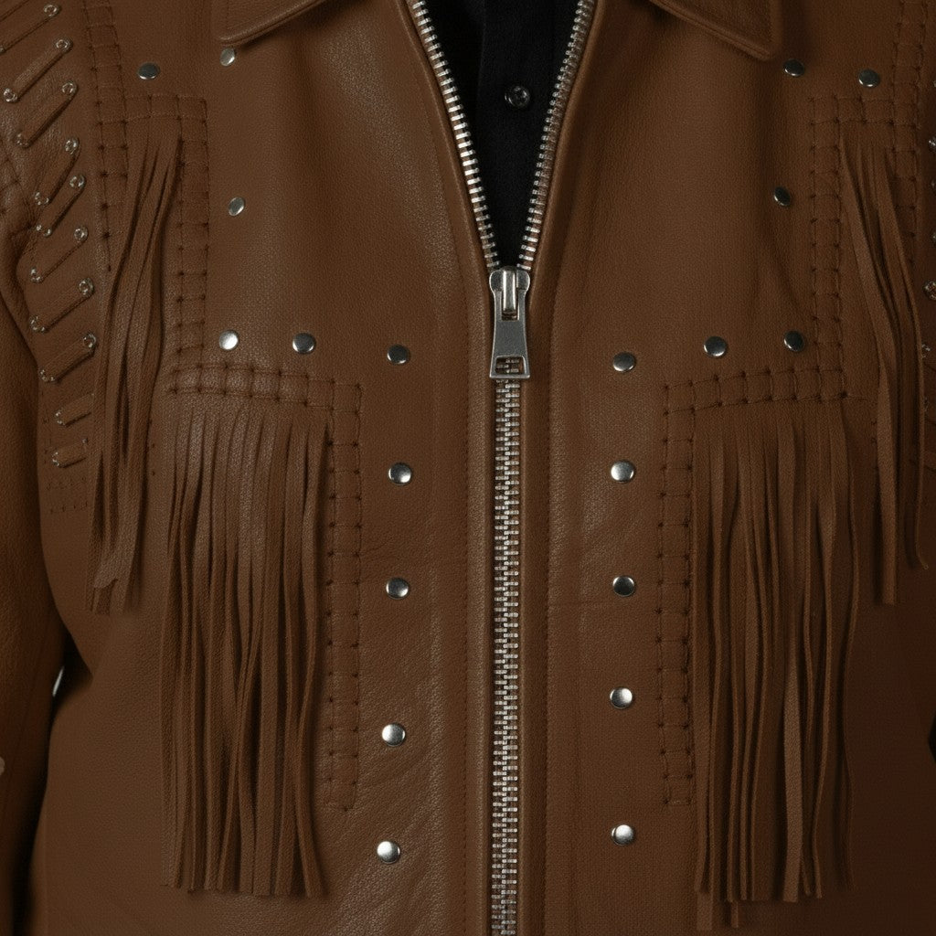 Brown leather jacket with fringes and studs on a plain background