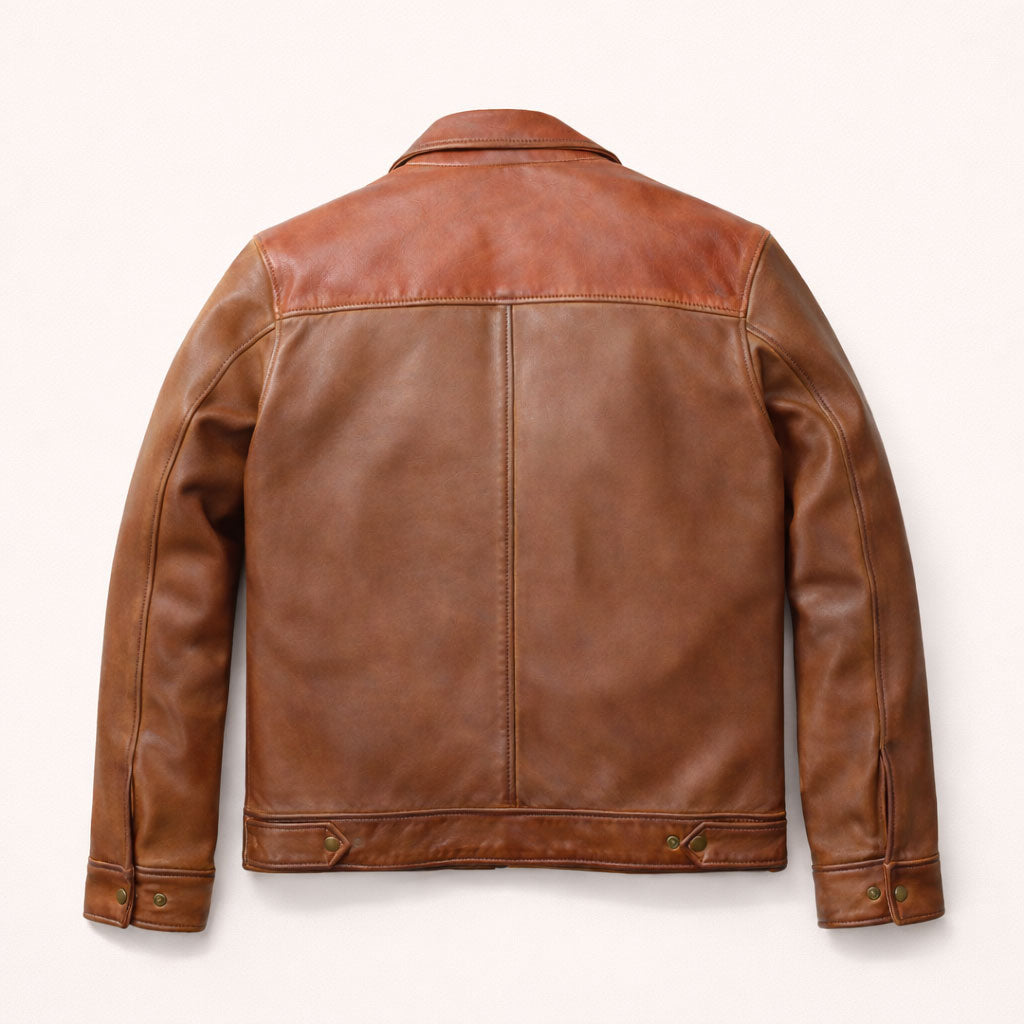Brown leather jacket on a white background
