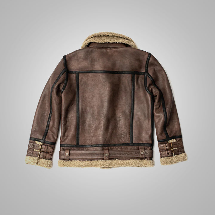 Brown leather jacket with shearling trim on a gray background