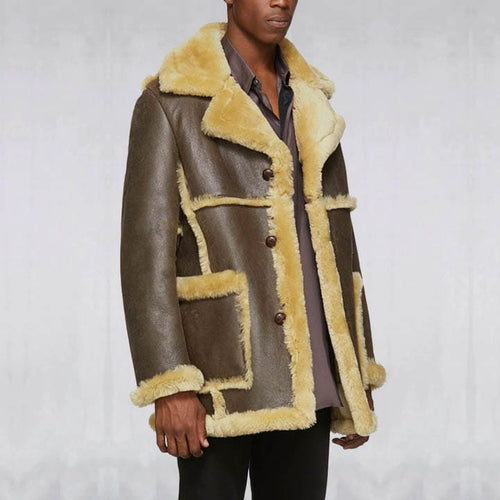 Man wearing a brown leather coat with yellow fur trim on a white background