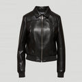Black leather jacket on a light gray background