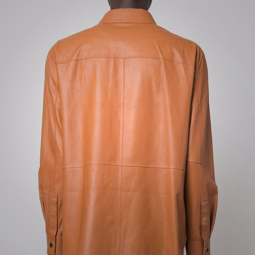 Brown leather jacket on a gray background
