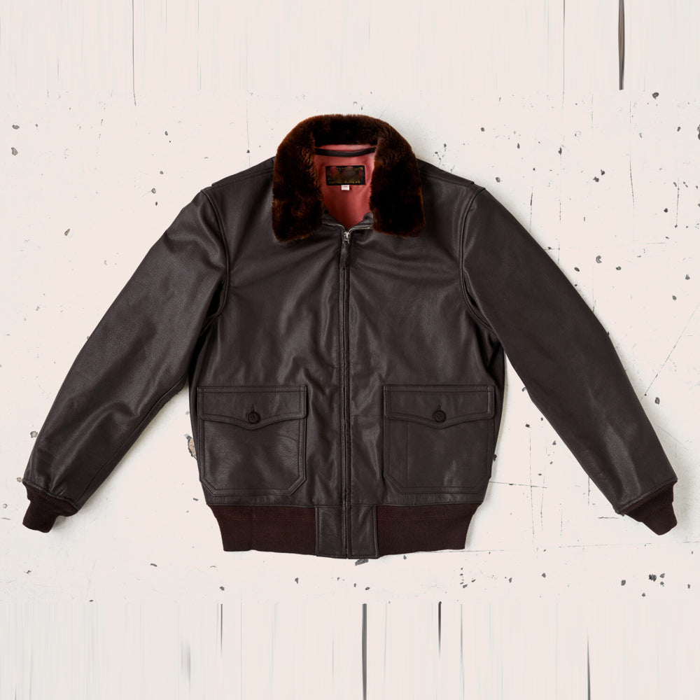 Dark brown jacket with fur hood on a white background