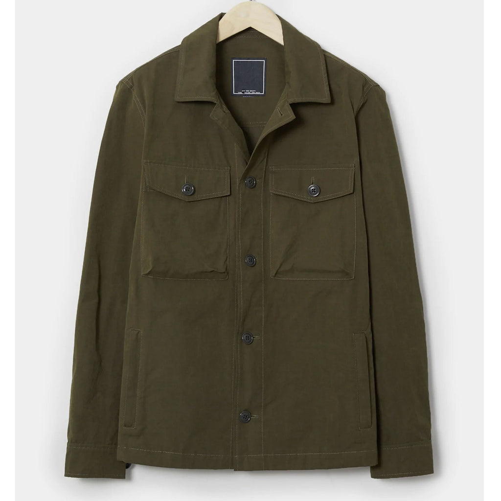 Green jacket with button details on a white background