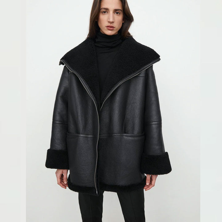 Women wearing black shearling jacket