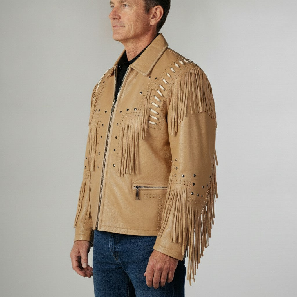 Man wearing a tan leather jacket with fringe details on a gray background