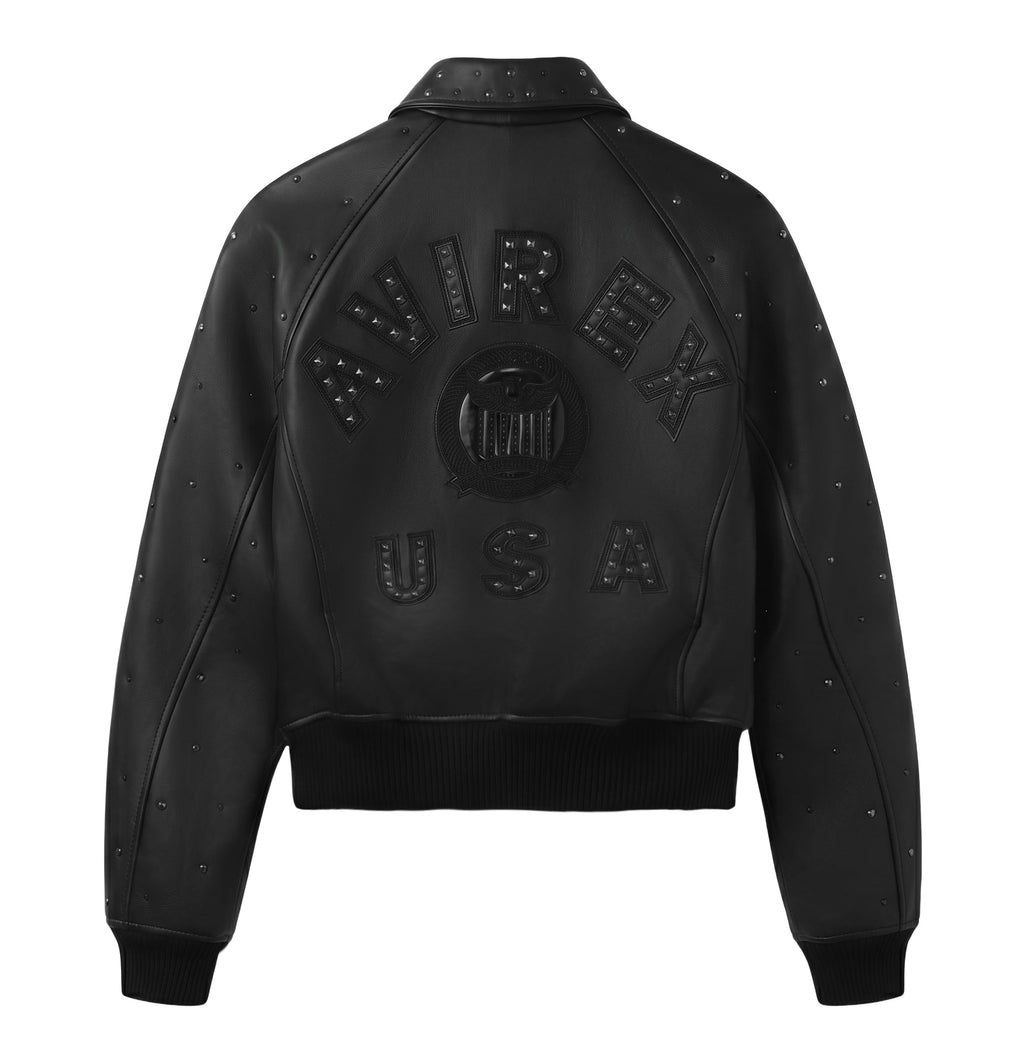 Back of women’s cropped Avirex jacket with raised logo and stud detailing
