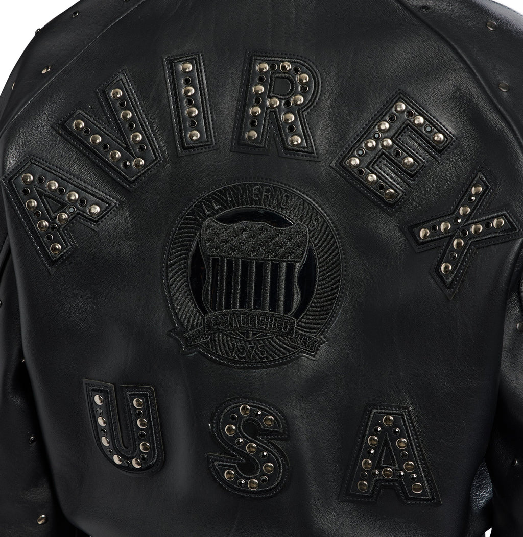 Close-up of black Avirex back appliqué, crest and metallic studs
