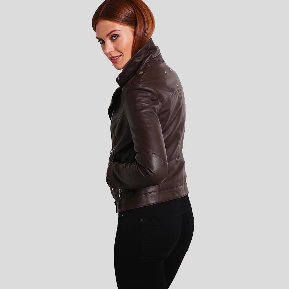 Woman wearing a brown leather jacket on a light gray background
