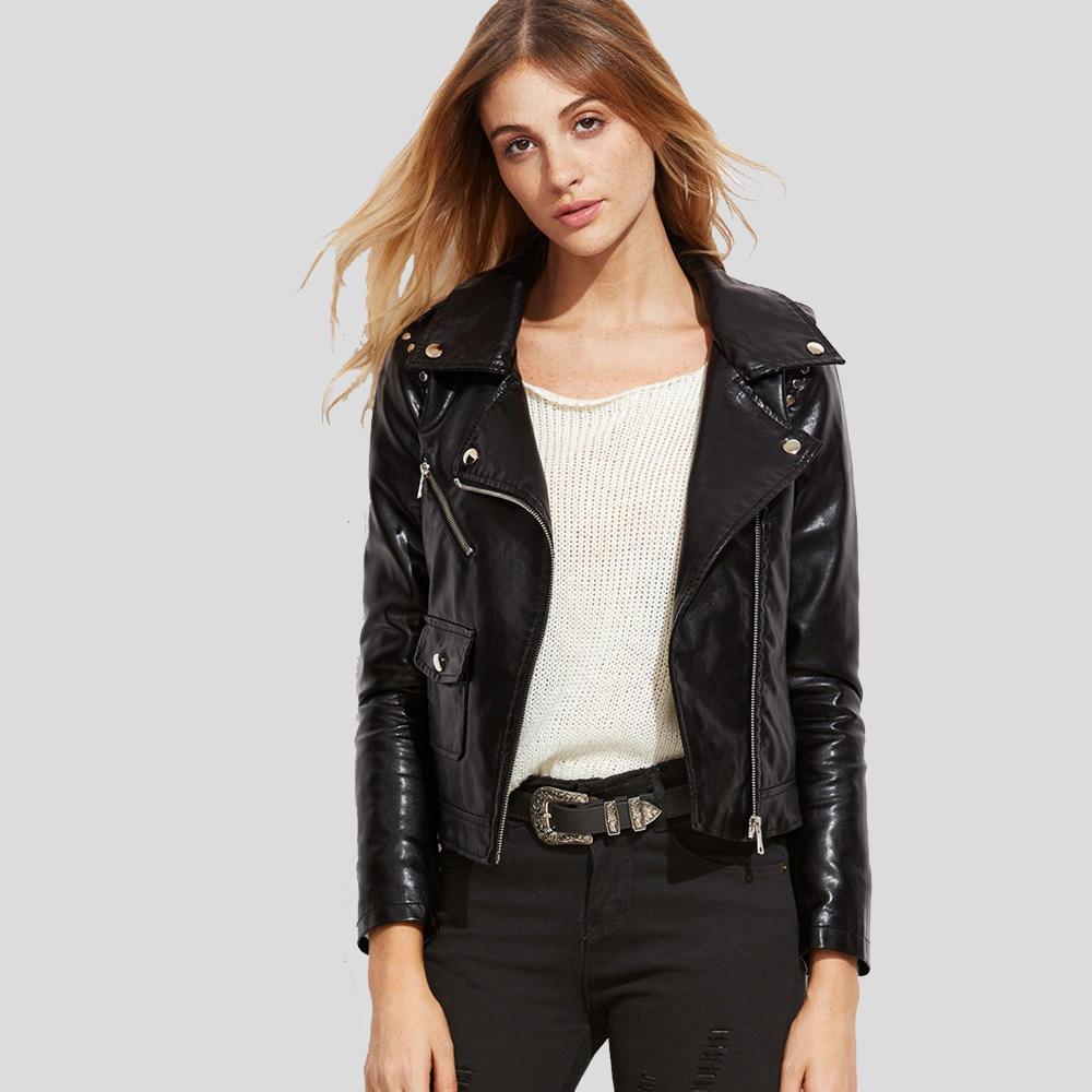 Woman wearing a black leather jacket on a gray background