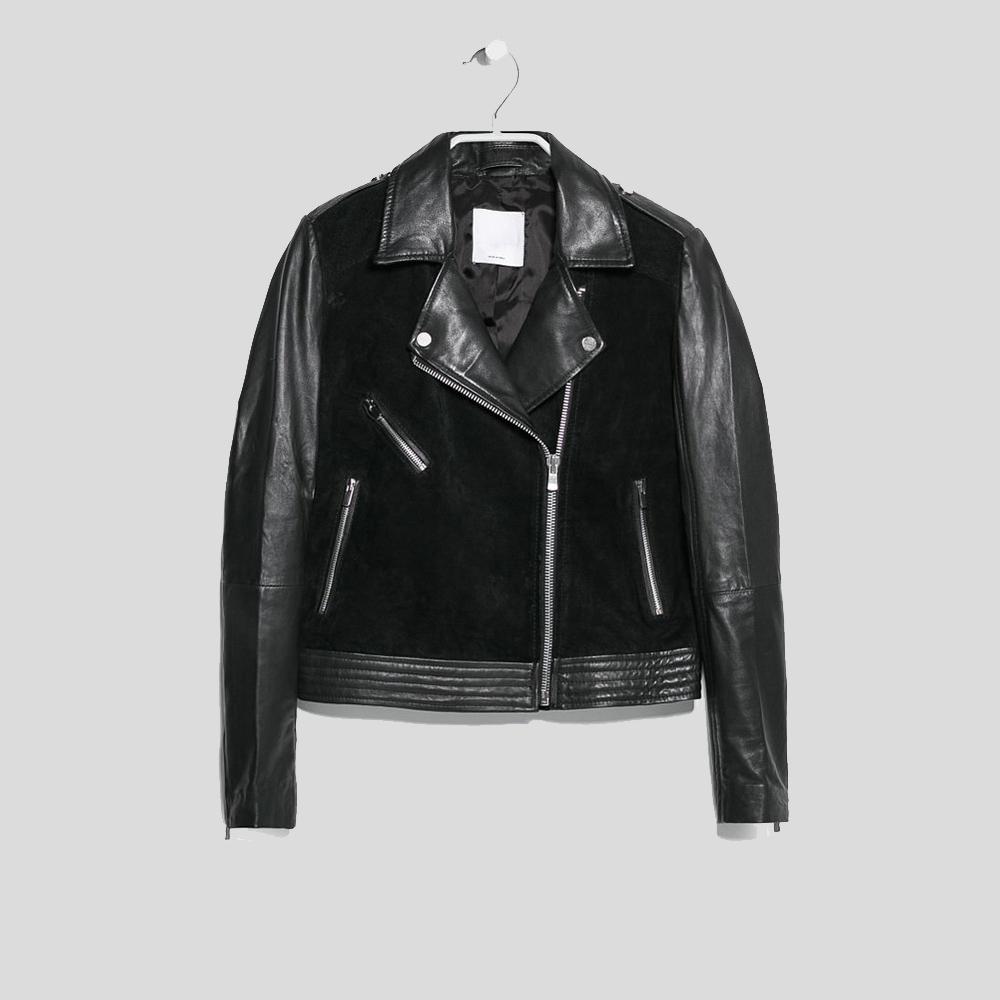 Black leather jacket on a hanger against a light gray background
