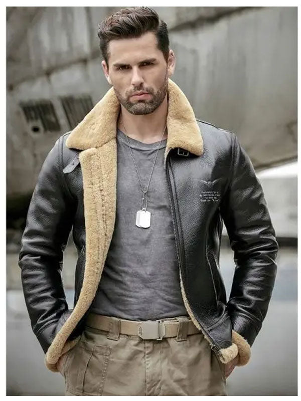 Man wearing a leather jacket with a fur-lined collar in an urban setting
