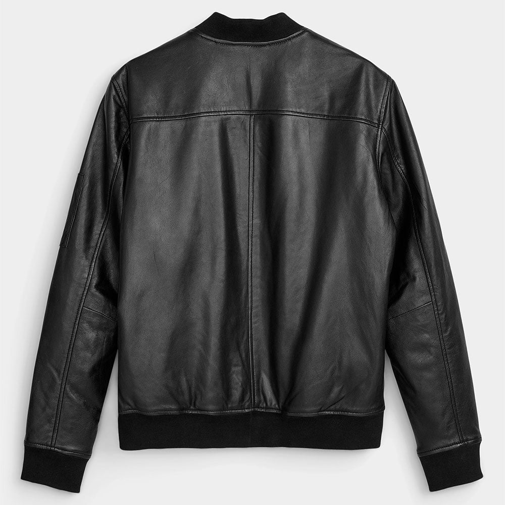 Black leather jacket on a light gray background