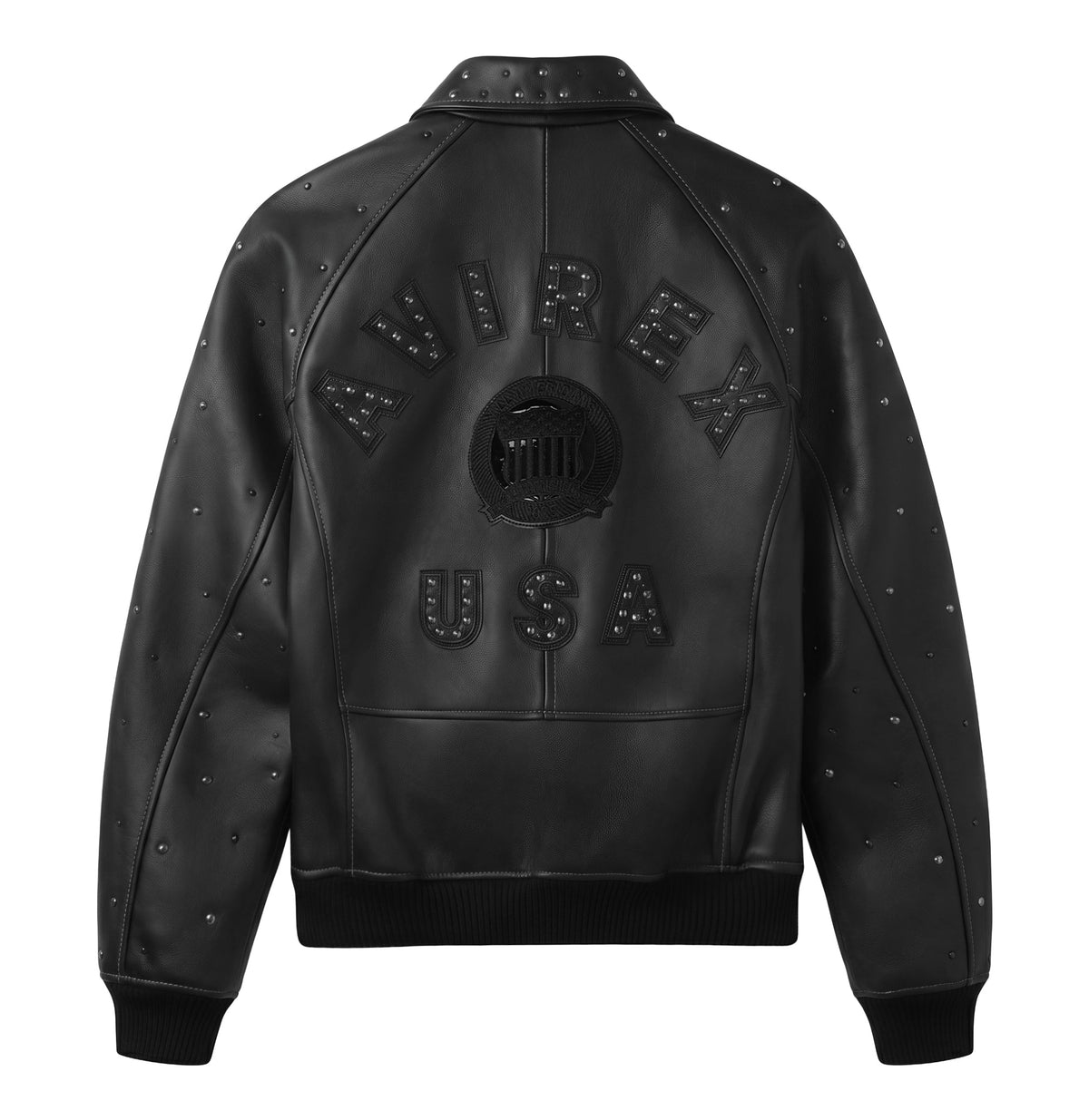 Black leather bomber jacket shown from the back, featuring a large embossed 'AVIREX USA' design with studded details and a central circular patch.