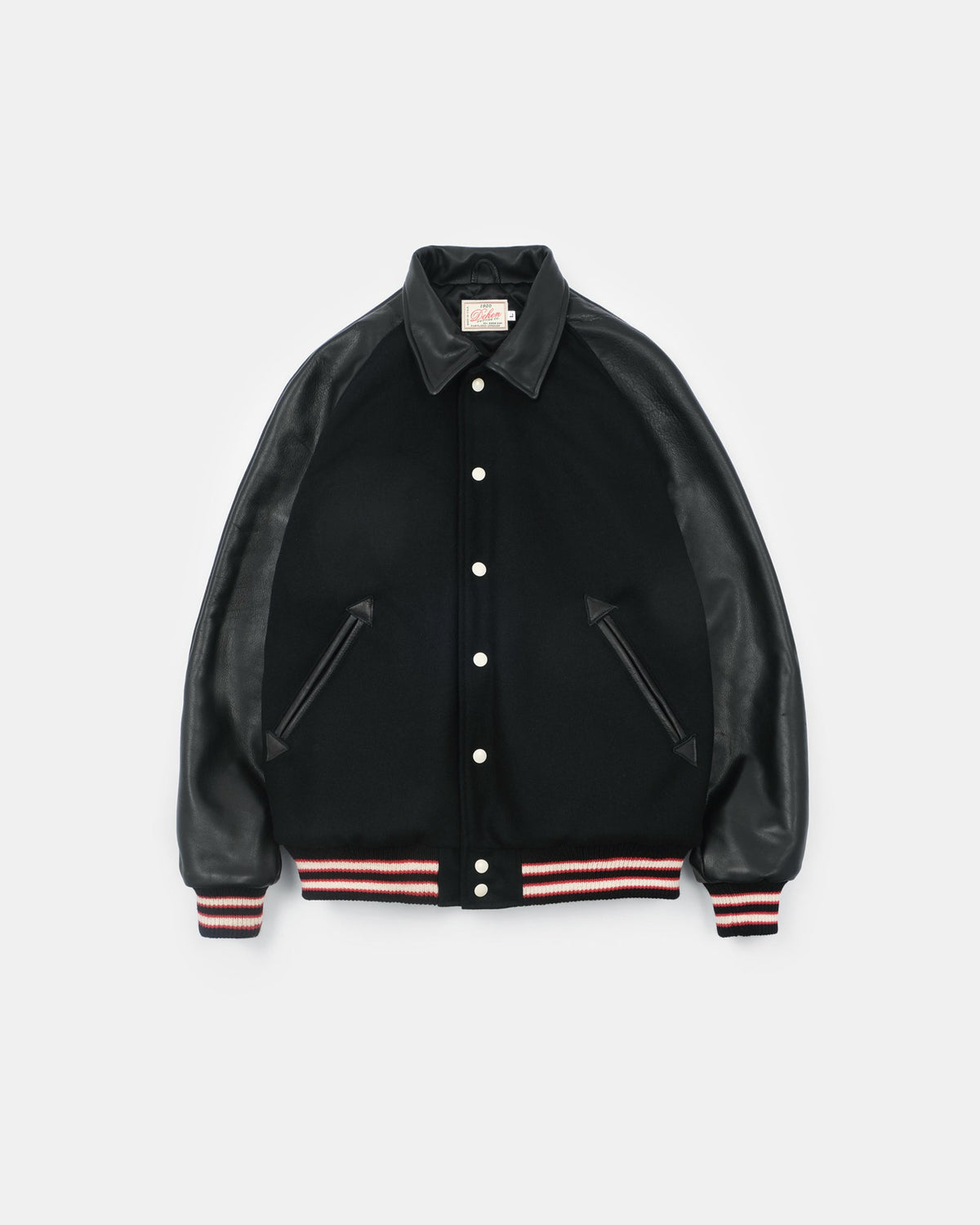Black varsity jacket with leather sleeves on a light gray background