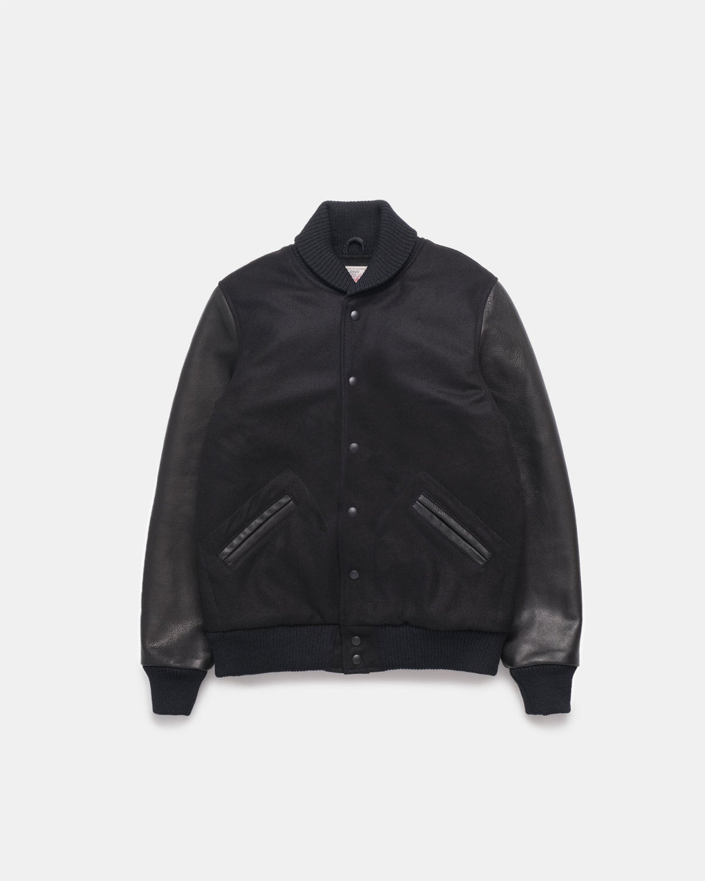 Black leather jacket on a light gray background