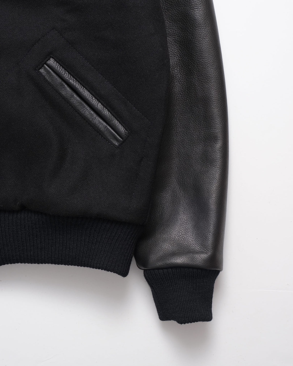 Black leather jacket with a white background