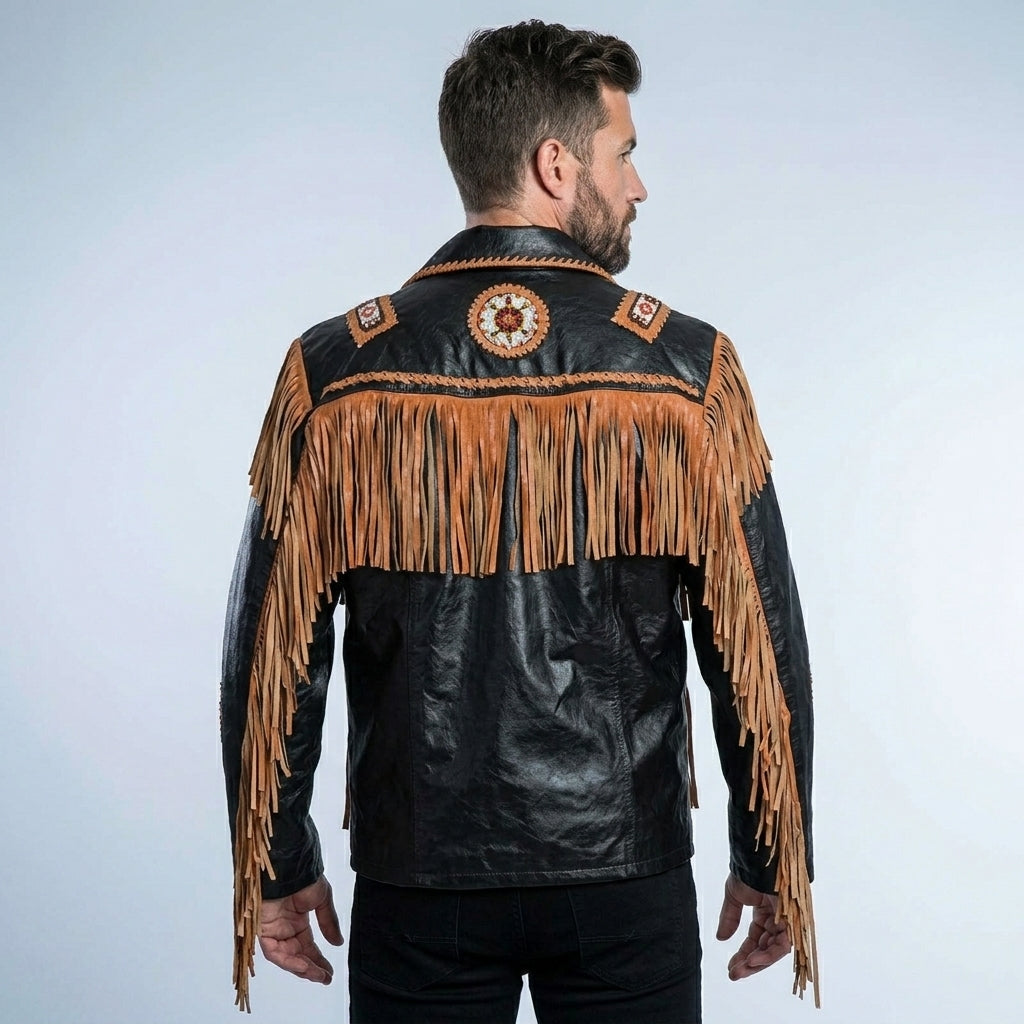 Man wearing a black leather jacket with brown fringes and decorative elements on a light gray background