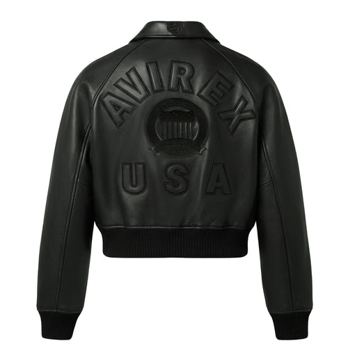 Back of women’s cropped Avirex jacket with tonal logo appliqué