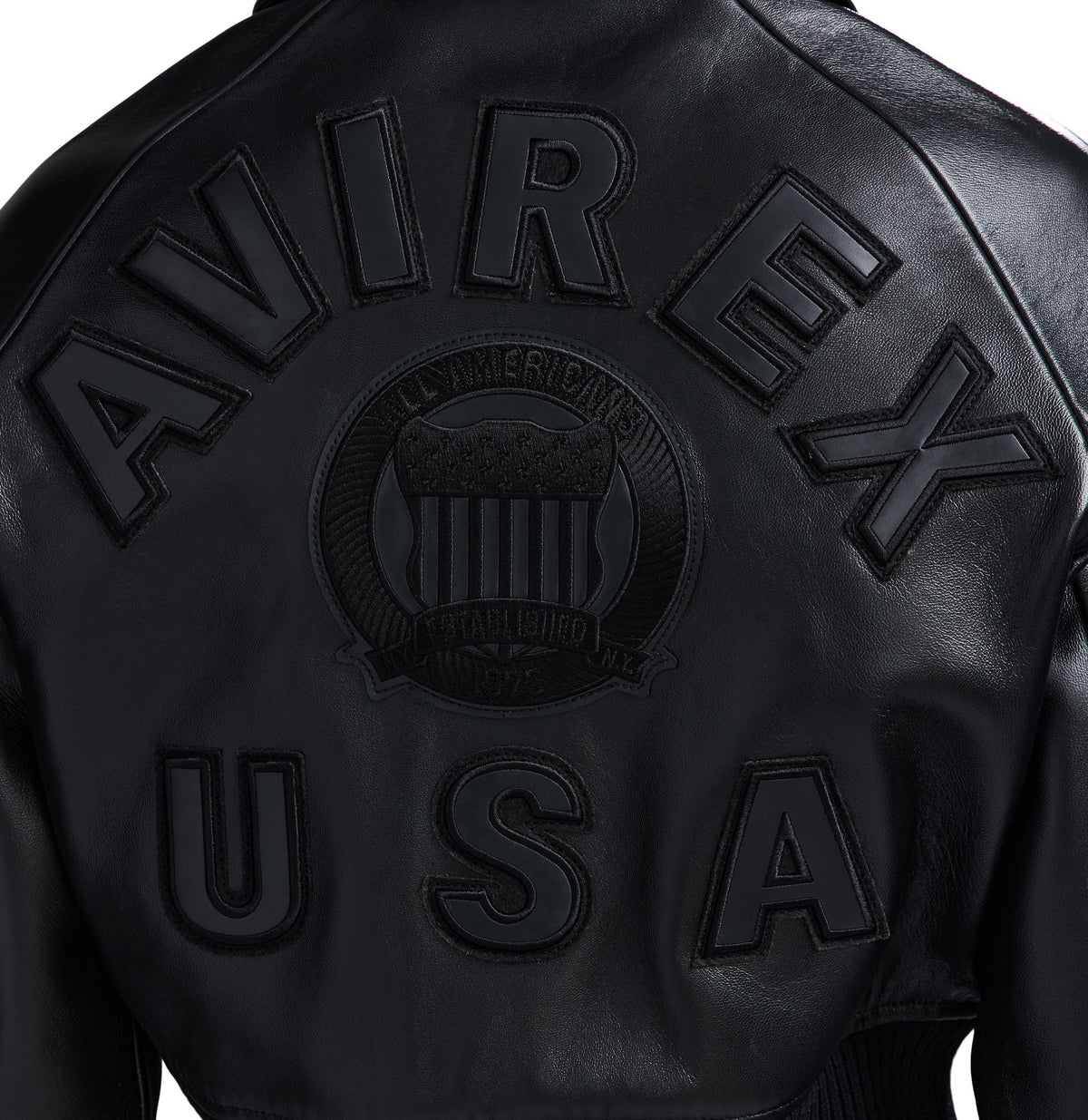 Tonal embroidered crest on black Avirex jacket back