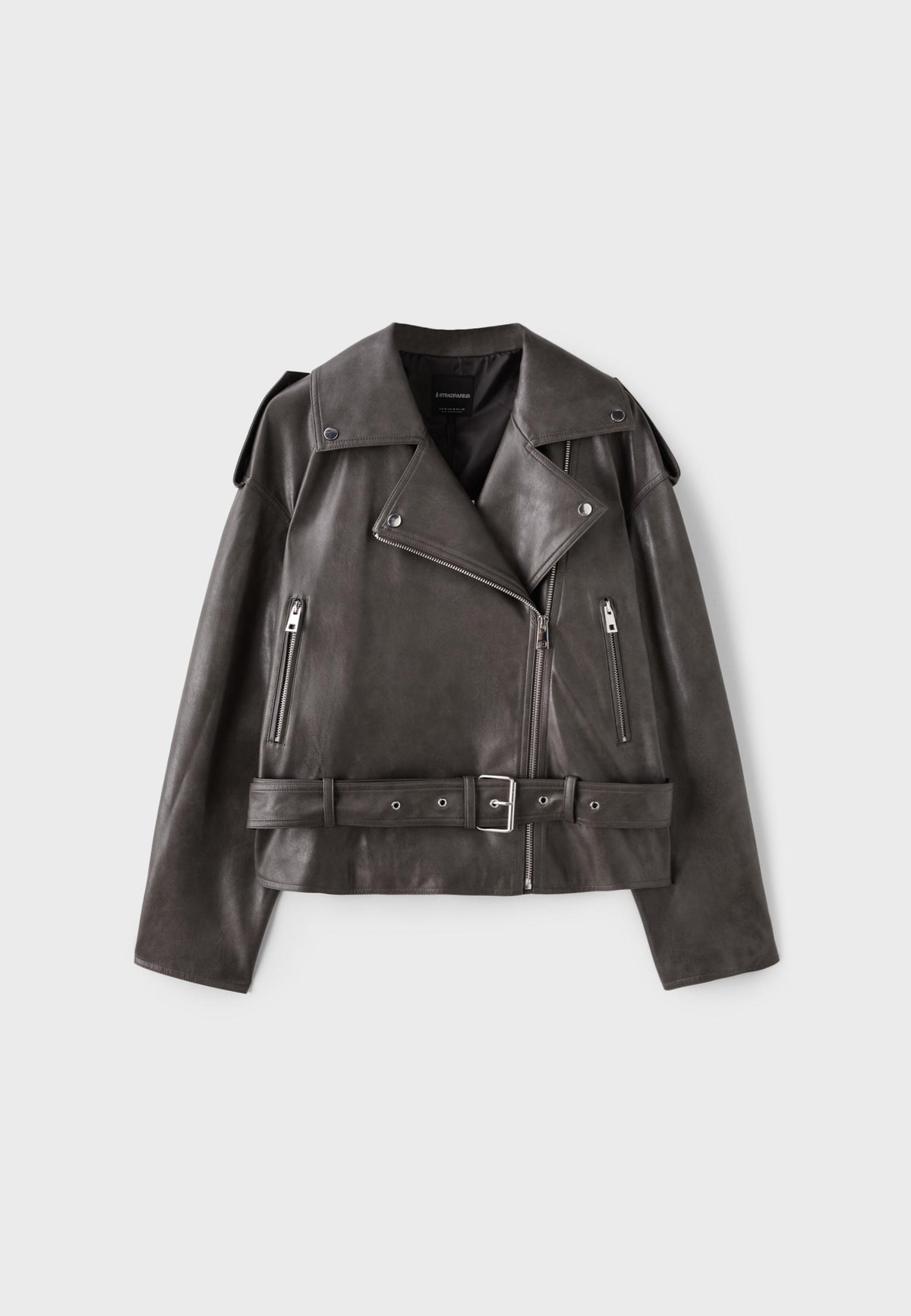 A dark brown leather moto jacket with silver hardware, featuring an asymmetrical zipper, shoulder epaulets, zippered chest pockets, and a matching belt with a silver buckle.