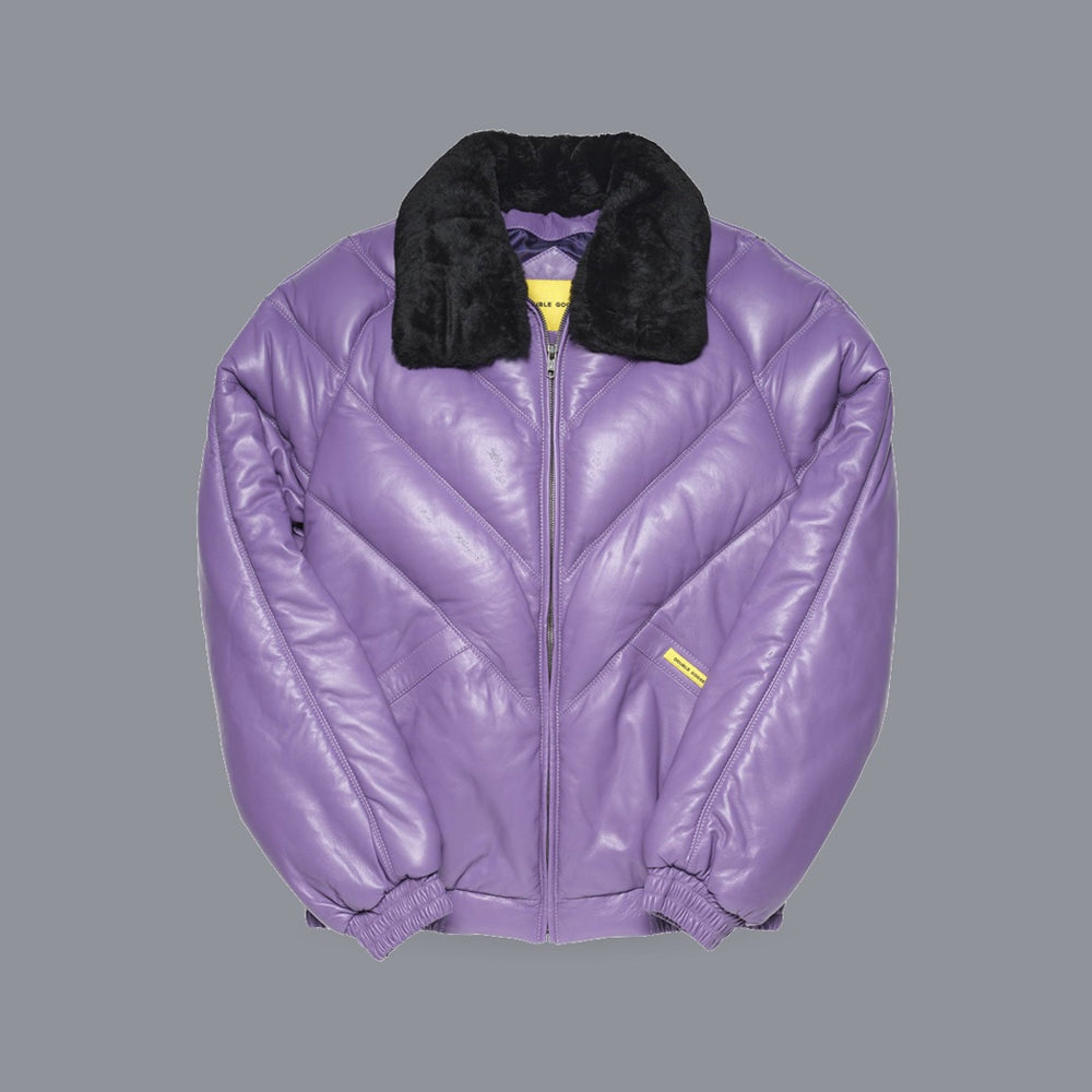 A purple quilted leather bomber jacket with a black fur collar, shown flat against a solid gray background.