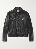 A black leather trucker jacket with a button-up front, chest flap pockets, and side pockets, displayed flat against a light gray background.