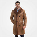 Man wearing a brown shearling coat on a white background