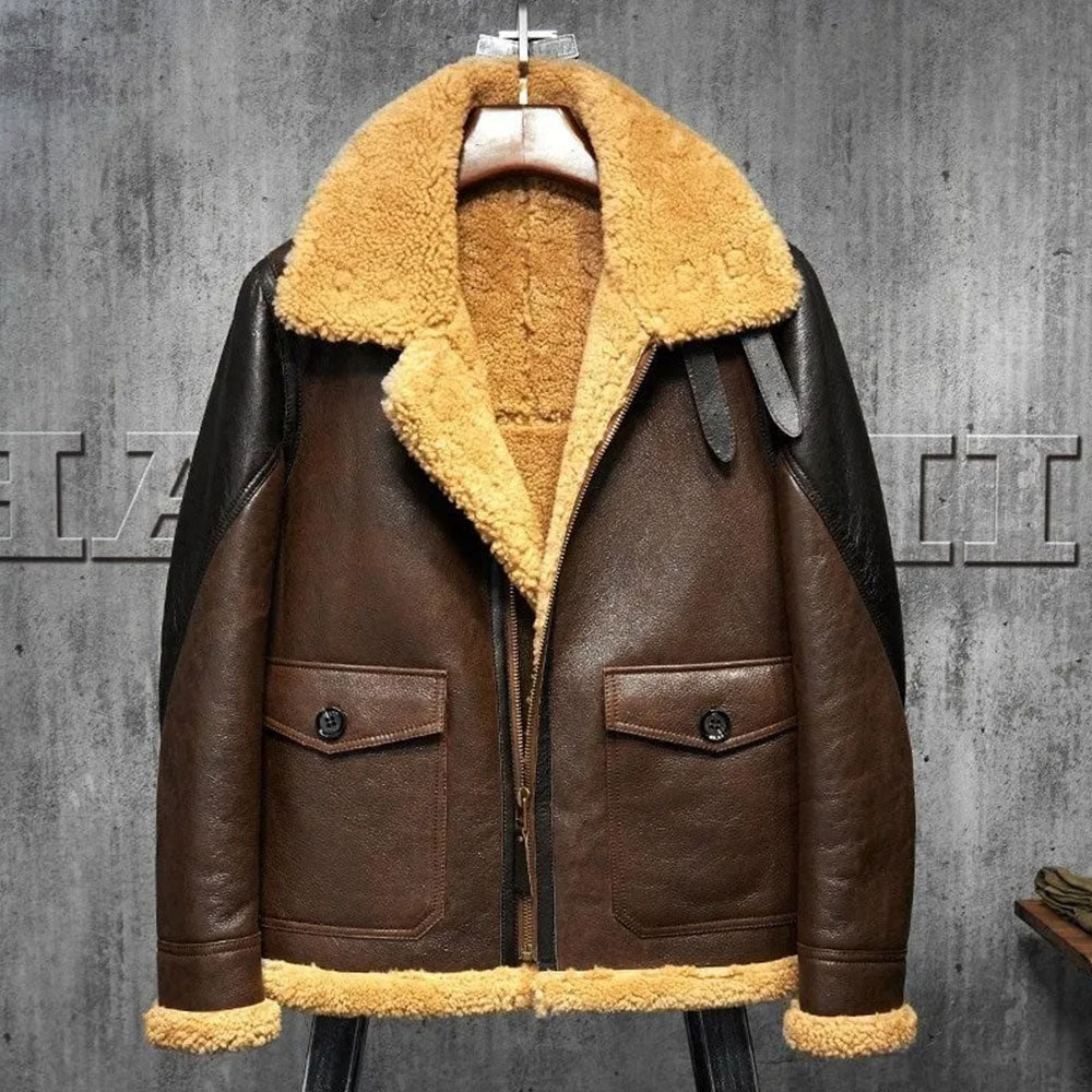 Brown leather jacket with yellow fur lining on a gray textured background