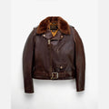 Brown leather jacket with fur collar on a white background