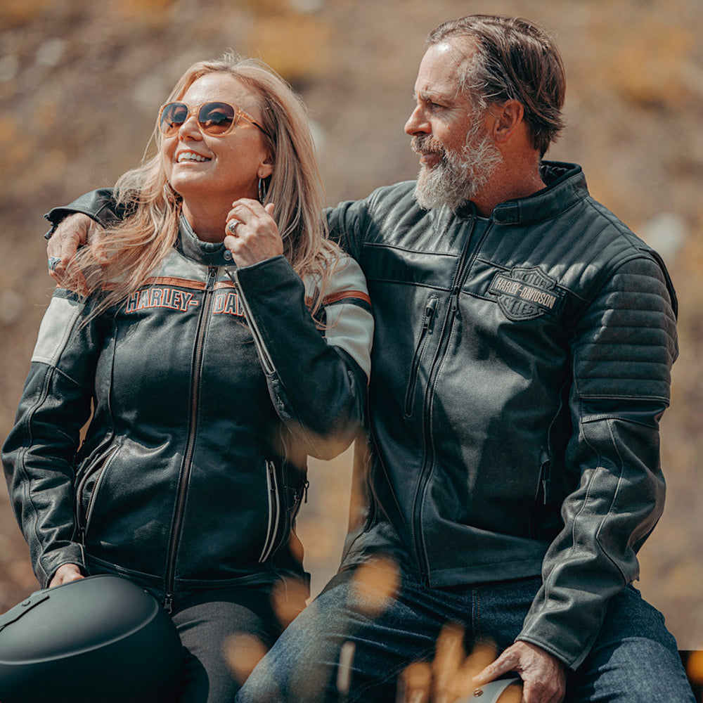 men and women wearing harley davidson jacket