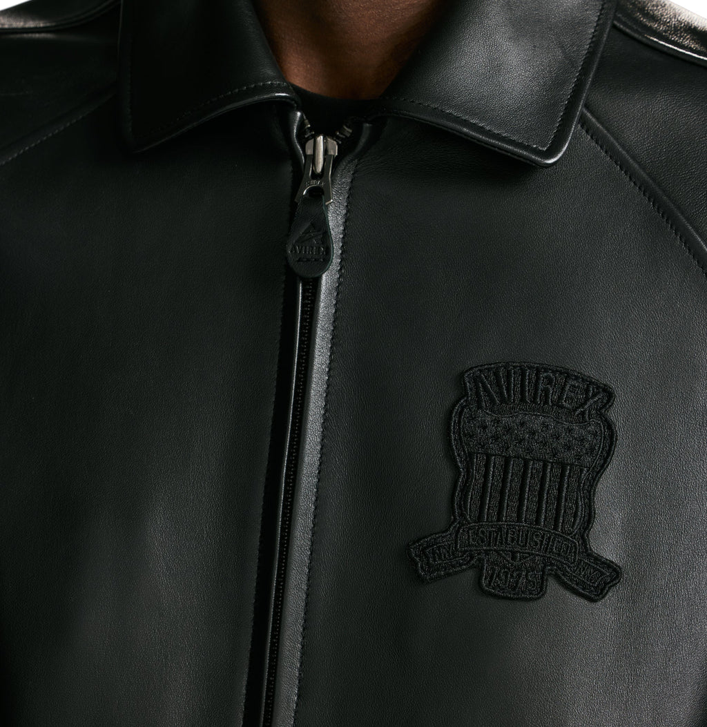 closeup view of avirex logo on chest