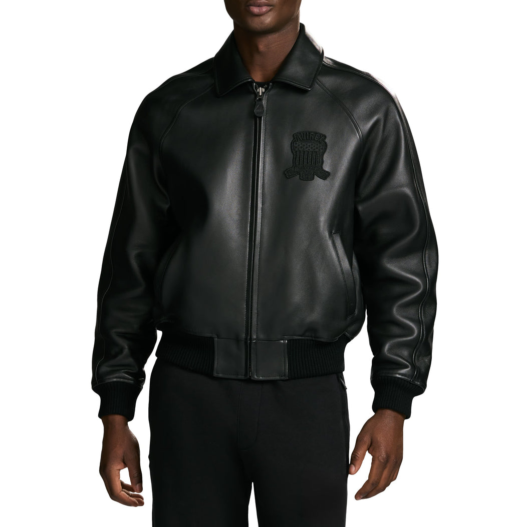 Black leather jacket with a logo on a white background