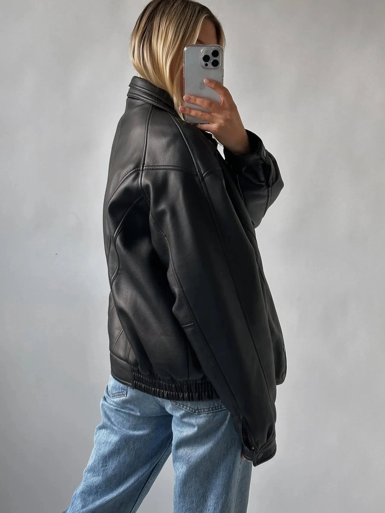 back view of women vintage retro leather jacket