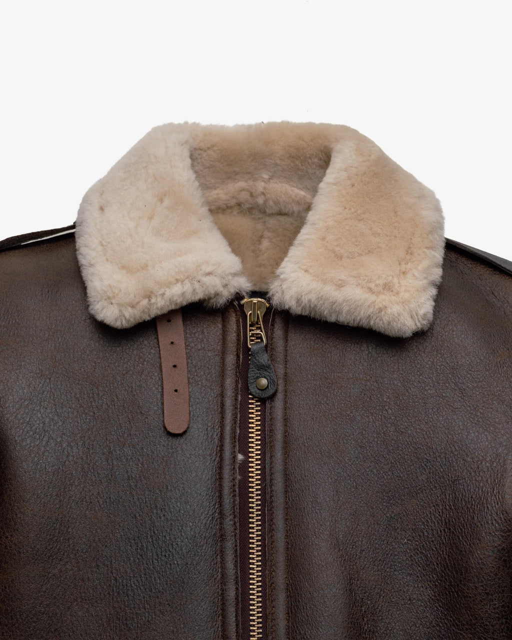 Brown leather jacket with beige shearling collar on a white background