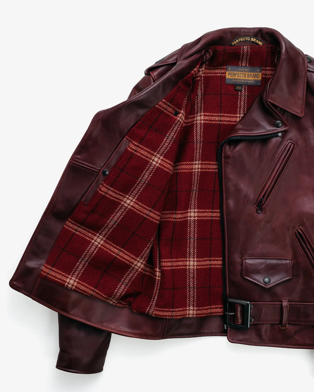 Leather jacket with plaid lining on a white background