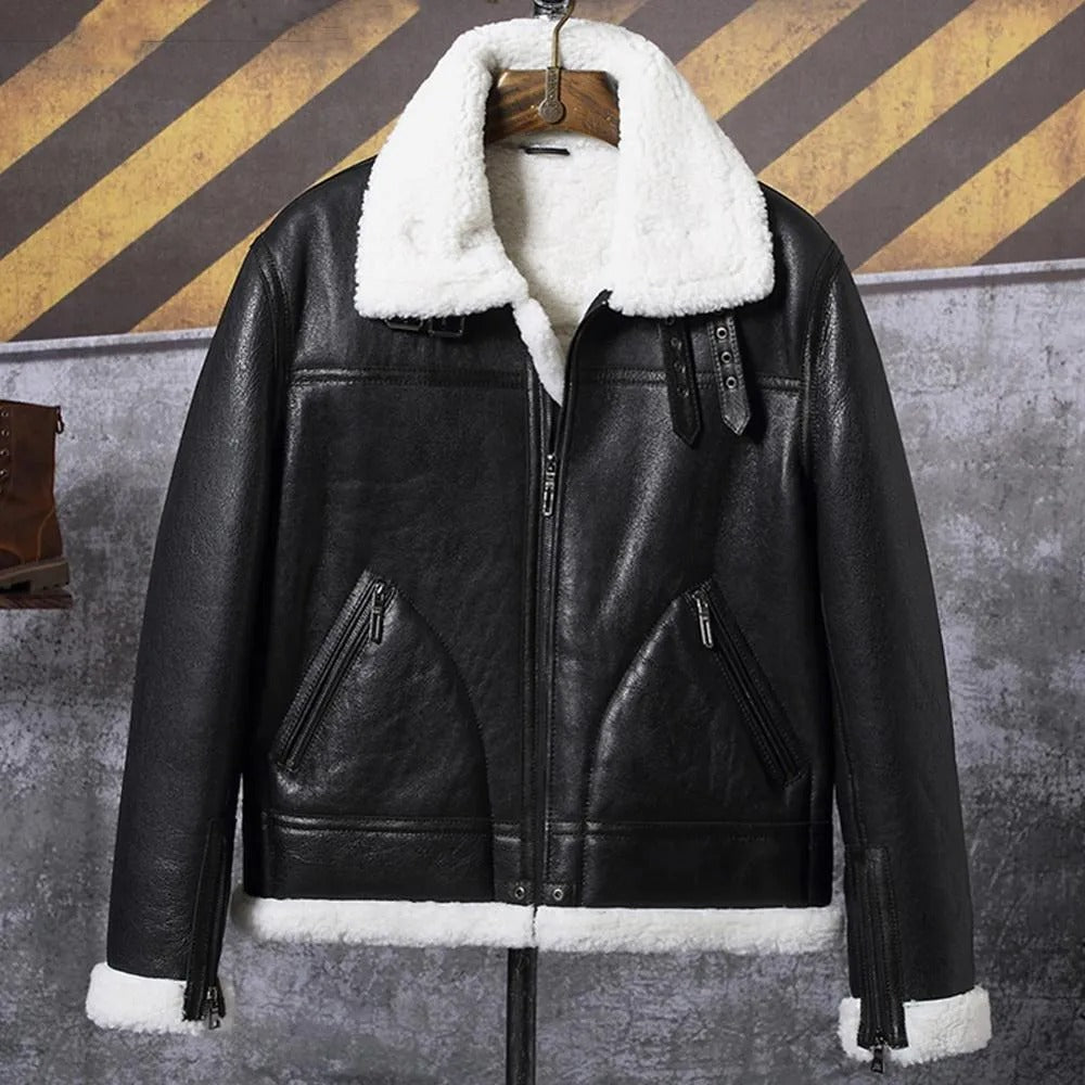 Black leather jacket with white fur lining on a hanger against a striped wall.