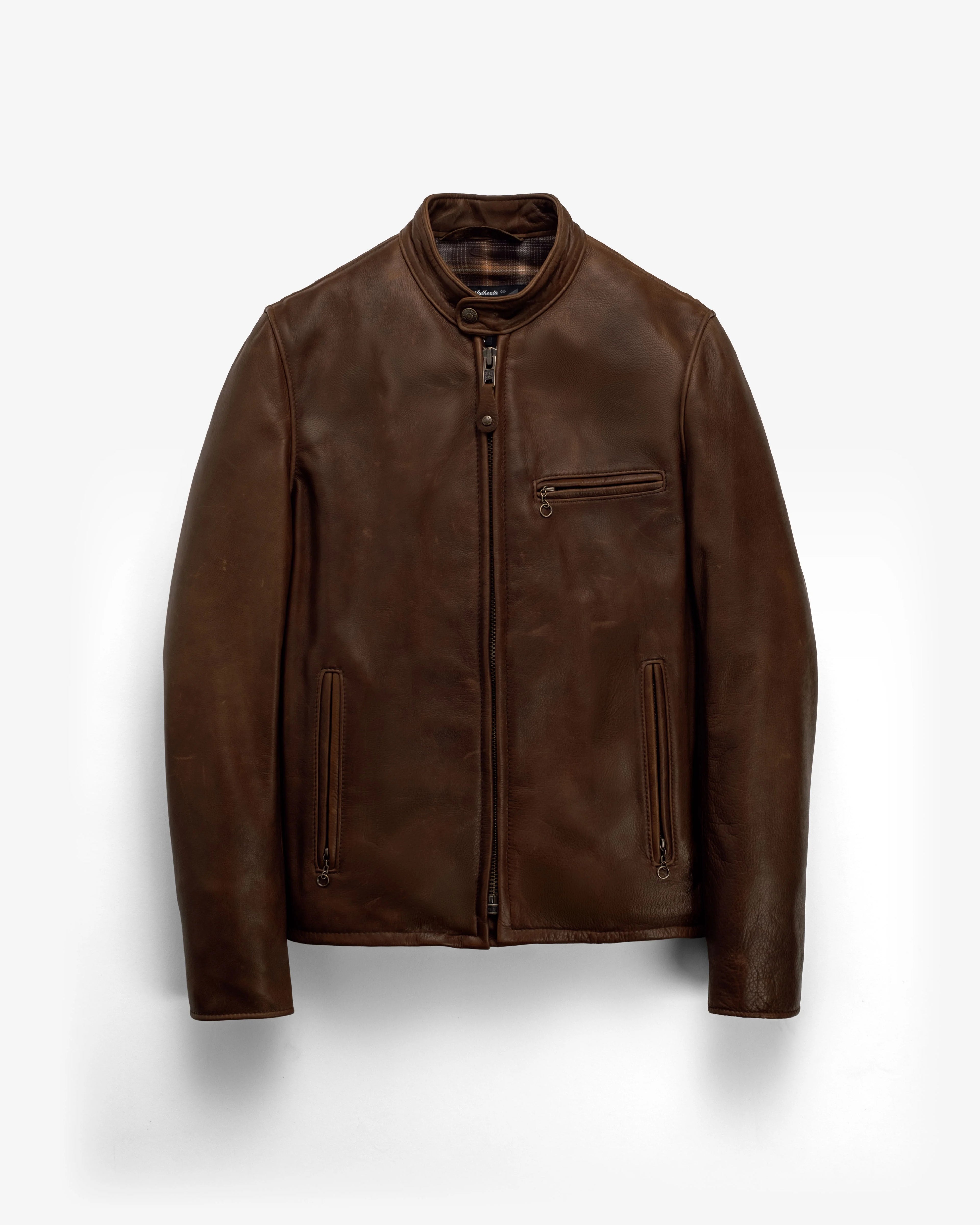 Brown leather jacket on a white background